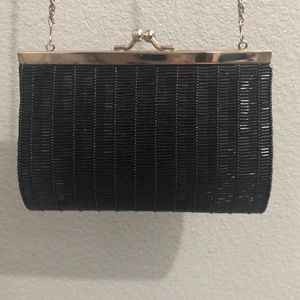 Beautiful black small purse with very long chain. Used once for special occasion